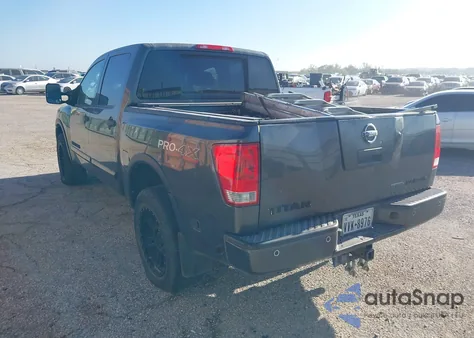 2012 Nissan Titan Pro-4X z USA, uszkodzony, nr VIN 1N6BA0EC7CN303323